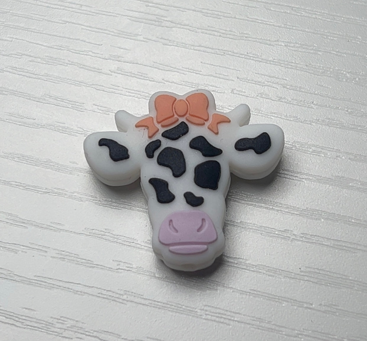Cow with bow silicone focal bead